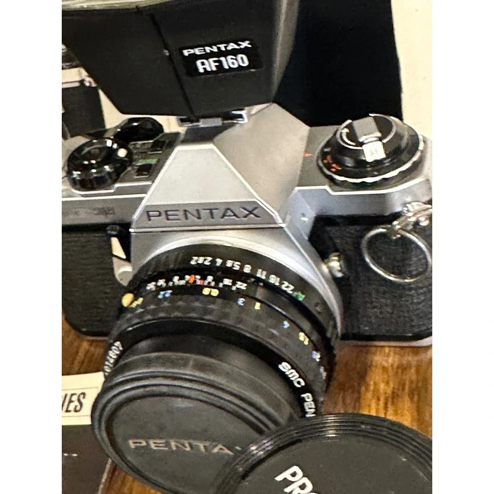 Pentax ME Super 35mm SLR Film Camera Kit with 28mm Lens AF160 Flash and Manuals